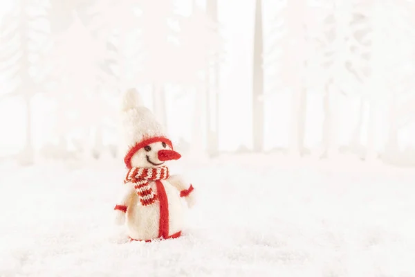 Closeup Cute Snowman Toy Artificial Snow Trees Background — Stock Photo, Image