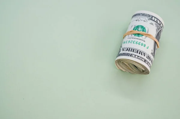 High Angle Shot Rolled Dollar Bills Green Surface — Stock Photo, Image