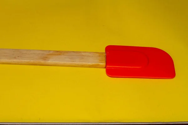 Top View Closeup Wooden Silicone Spatula Isolated Yellow Background — Stock Photo, Image