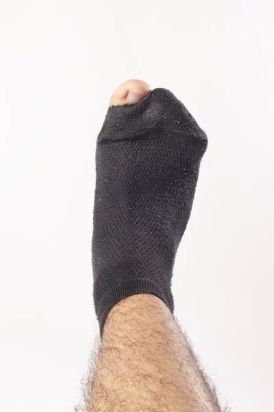 Vertical Shot Foot Male Wearing Black Sock Hole Isolated White — Stock Photo, Image