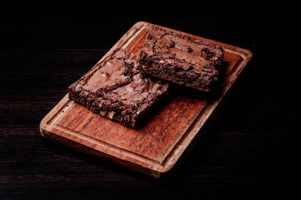 Closeup Two Pieces Tasty Chocolate Cake Wooden Board — Stock Photo, Image