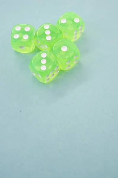 Top View Closeup Five Neon Green Dice Isolated Blue Background — Stock Photo, Image