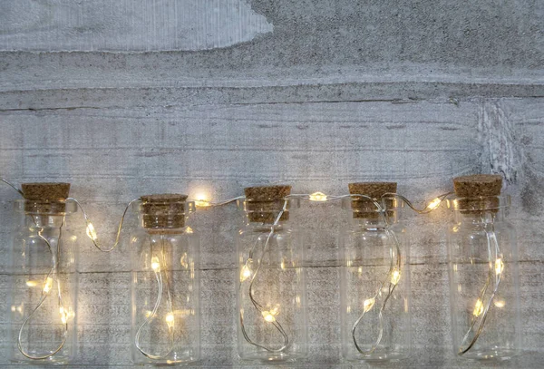 Close Frascos Vidro Com Luzes Sobre Eles Para Decoração Natal — Fotografia de Stock