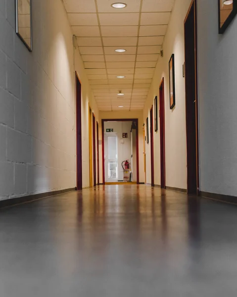 A vertical shot of a building corridor