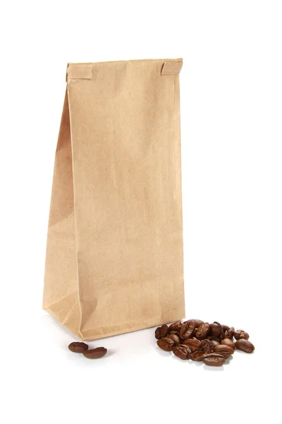 纸袋旁边的咖啡豆立柱 — 图库照片