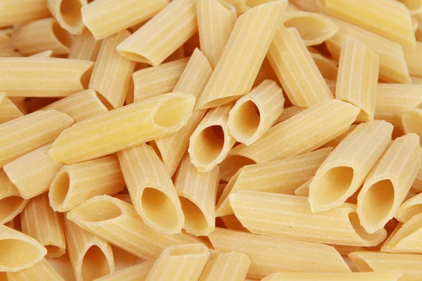 Een Close Shot Van Rauwe Pasta Geïsoleerd Een Witte Achtergrond — Stockfoto