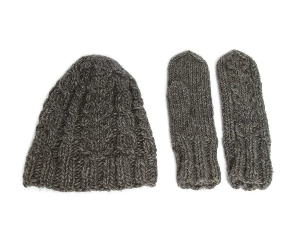 Une Paire Gants Gris Tricotés Chapeau Sur Une Surface Blanche — Photo