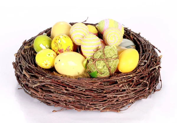 Closeup Variety Colorfully Decorated Easter Eggs Artificial Nest White Background — Stock Photo, Image