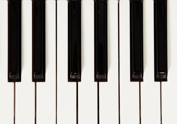 Tasti Pianoforte Uno Sfondo — Foto Stock