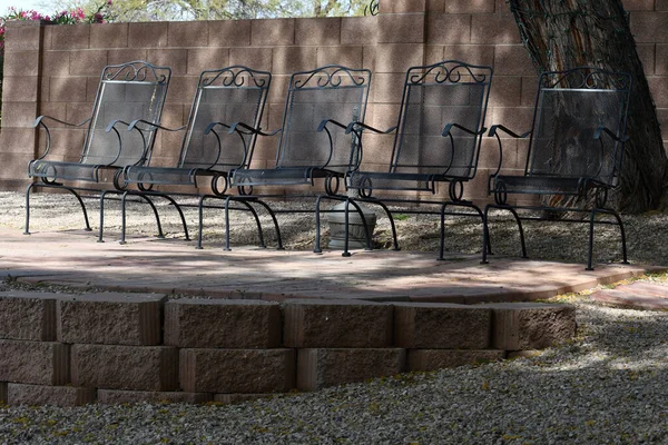 Five Black Chair Outdoor Area Partial Sunlight — Stock Photo, Image