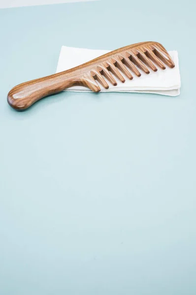 Wooden Comb Isolated White Handkerchief Light Blue Background — Stock Photo, Image