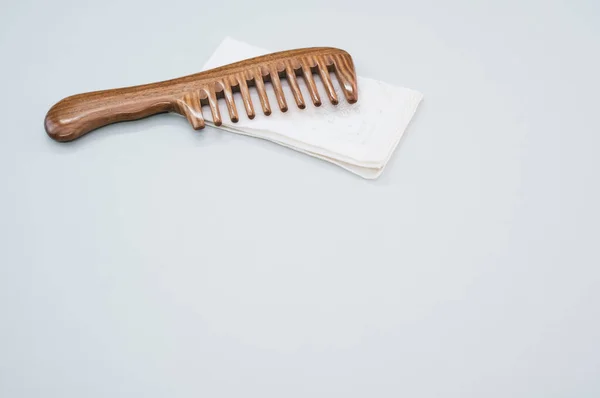 Wooden Comb Isolated White Handkerchief Gray Background — Stock Photo, Image