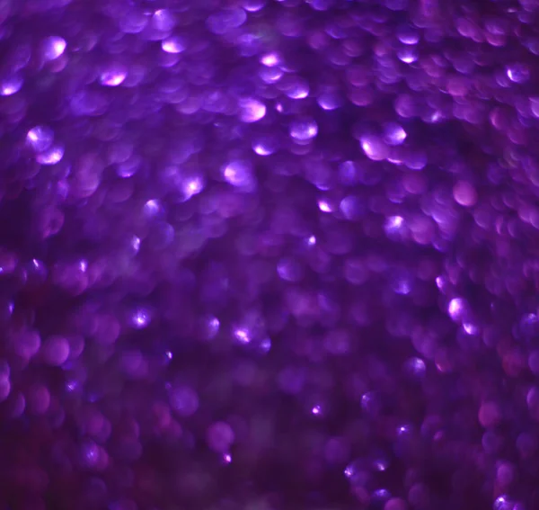 光沢のある紫色のスパンコール ぼやけた抽象的な背景 — ストック写真
