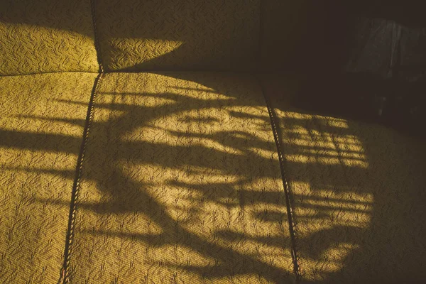 Shot Shadow Candle Arch Yellow Couch — Stock Photo, Image