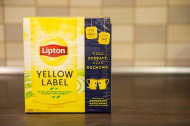 POZNAN, POLAND - Nov 13, 2020: Lipton Yellow Label black tea in a box clipart