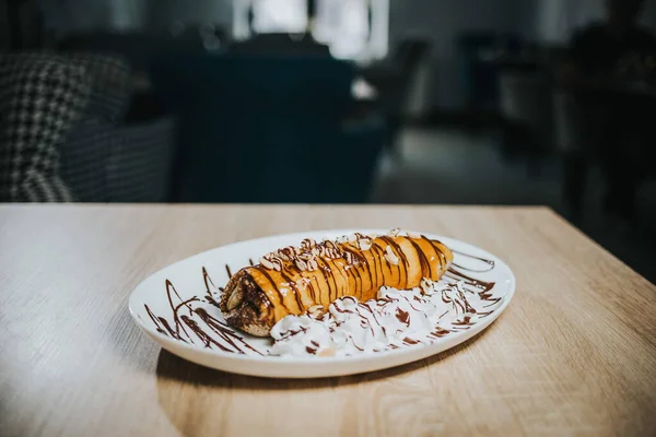 Gourmet Dish Rolled Crepe Whipped Cream Chocolate Sauce — Stock Photo, Image