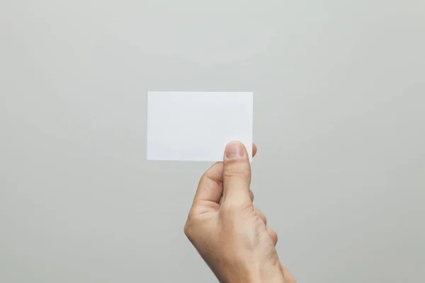 Een Close Shot Van Een Hand Die Een Blanco Papier — Stockfoto