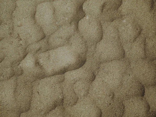 Abstrakcyjne Ujęcie Falistego Piasku Plażowego Tapetę Tło — Zdjęcie stockowe