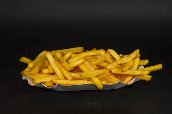 Närbild Bild Läckra Pommes Frites Svart Bakgrund — Stockfoto