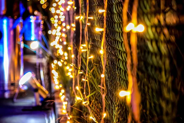 Closeup Shot Bright String Lights Hanging Wall — Stock Photo, Image