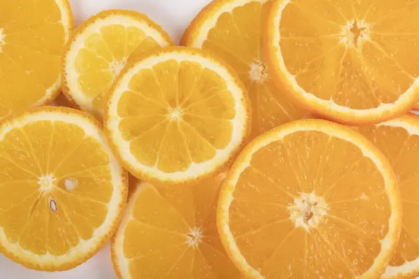 Viele Orangenscheiben Isoliert Auf Weißem Hintergrund — Stockfoto