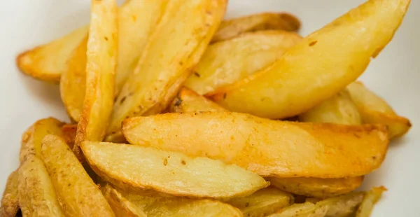 Primer Plano Deliciosas Papas Fritas Sobre Fondo Borroso — Foto de Stock