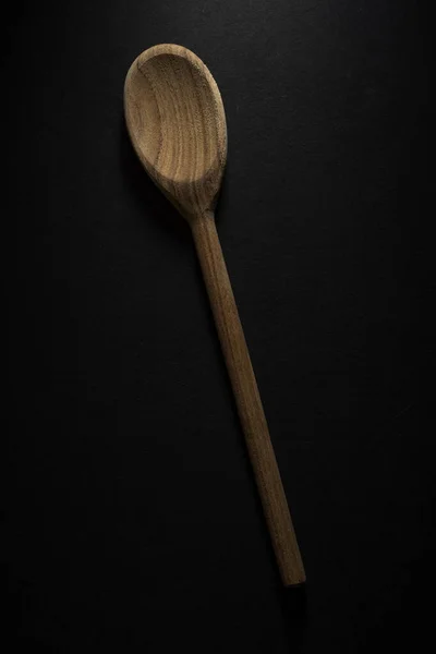 Vertical Shot Big Wooden Spoon Isolated Black Background — Stock Photo, Image