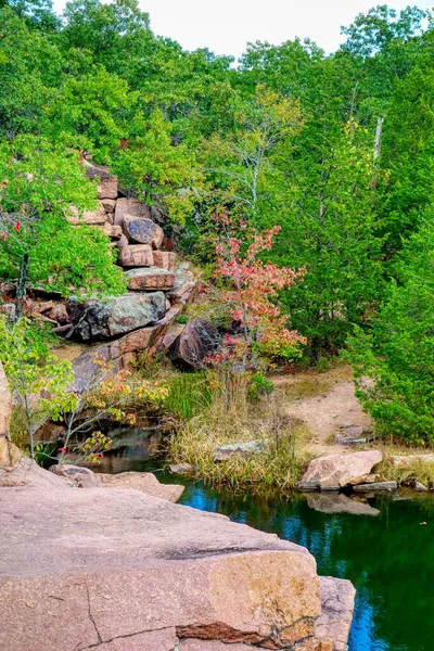 Vertical Shot Stream Surrounded Rocks Greenery Forest — Stock Photo, Image