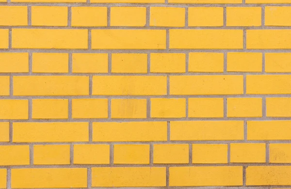 Duvar Kağıdı Veya Arkaplan Için Sarı Tuğla Bir Duvar — Stok fotoğraf