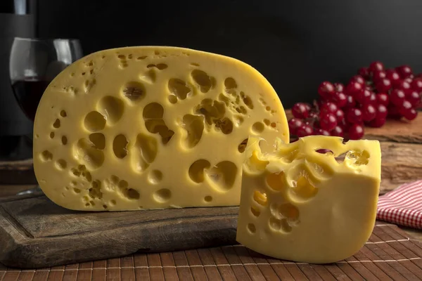 Closeup Shot Block Gourmet Swiss Cheese Wooden Board — Stock Photo, Image