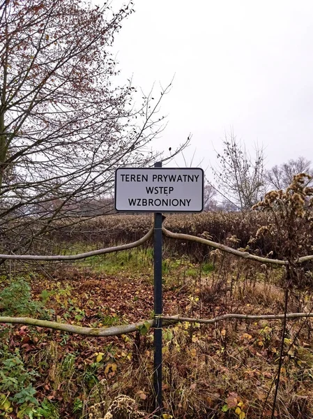 Rural area - Private Area No Trespassing sign in Polish.
