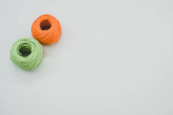 Orange Green Yarn Balls Isolated Gray Background — Stock Photo, Image