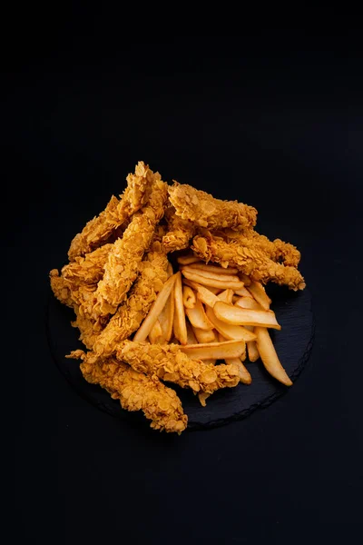 Vertical Shot Fried Food Black Surface — Stock Photo, Image