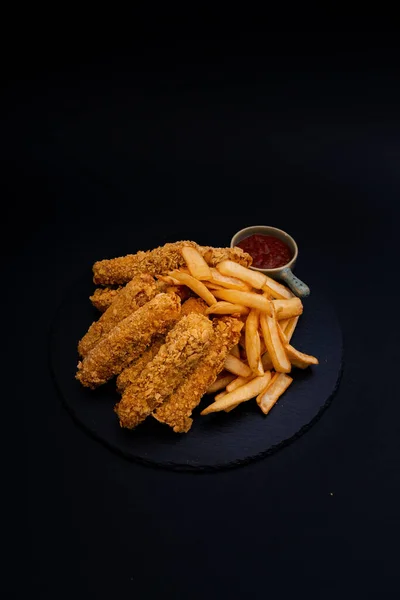 Vertical Shot Fried Food Black Surface — Stock Photo, Image