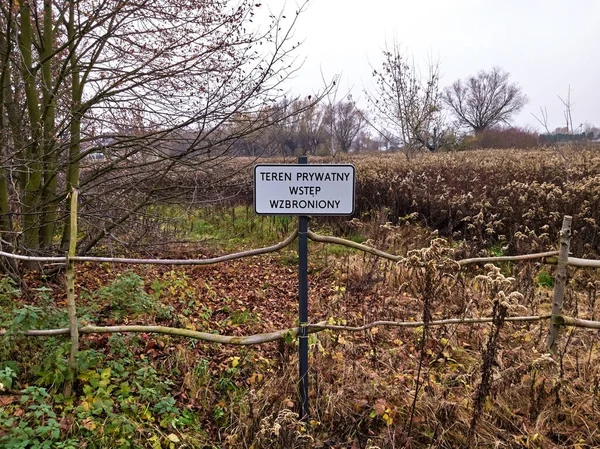 Rural area - Private Area No Trespassing sign in Polish.