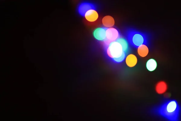 Blurred Colourful Christmas Light Black Background Copy Space — Stock Photo, Image