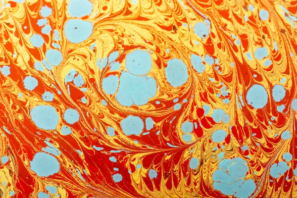 Pomarańczowy Żółty Wzór Marmuru Tło Niebieskimi Plamkami — Zdjęcie stockowe