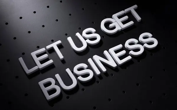 White Let Get Business Text Black Spotty Background — стоковое фото