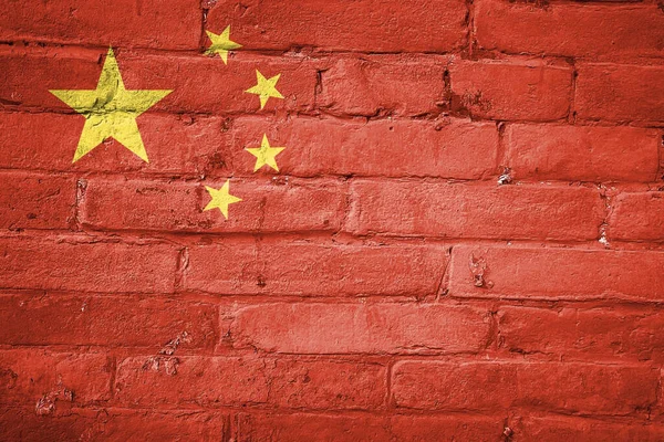 Снимок Китайского Флага Нарисованного Кирпичной Стене — стоковое фото