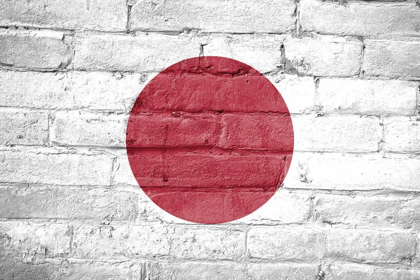 Tiro Bandeira Japonesa Pintado Uma Parede Tijolo — Fotografia de Stock