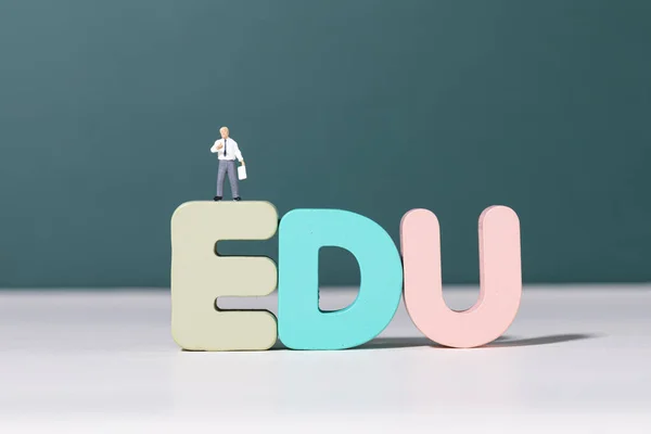 View Teacher Figurine Standing Edu Letters — Stock Photo, Image