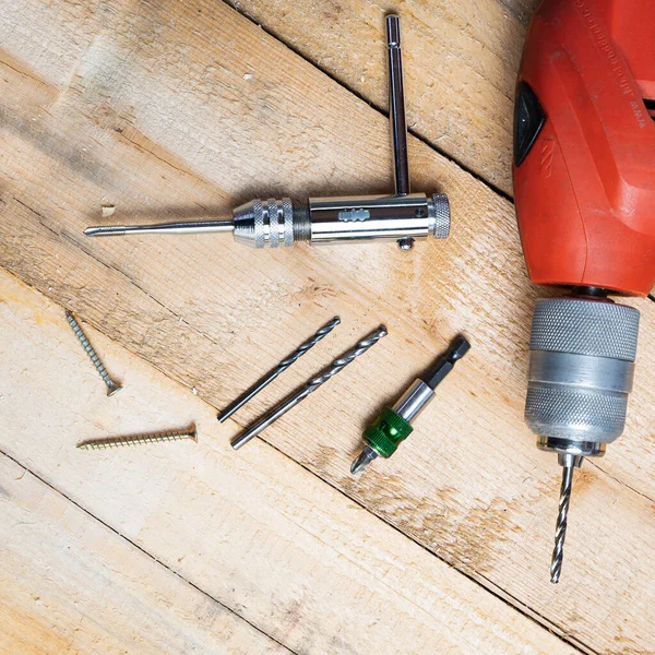 Top View Electric Drill Nails Other Repairing Equipments Wooden Surface — Stock Photo, Image