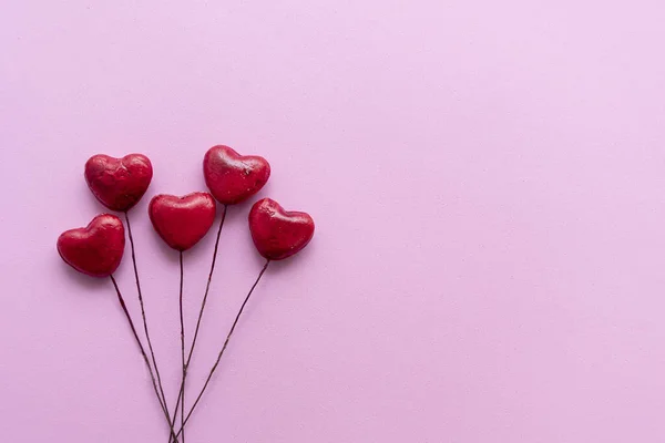 Små Röda Hjärtan Rosa Bakgrund — Stockfoto
