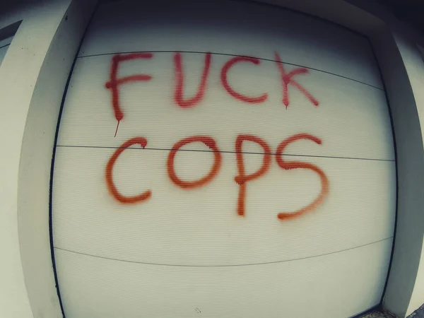 White Wall Words Fuck Cops Written Spray Paint — Stock fotografie