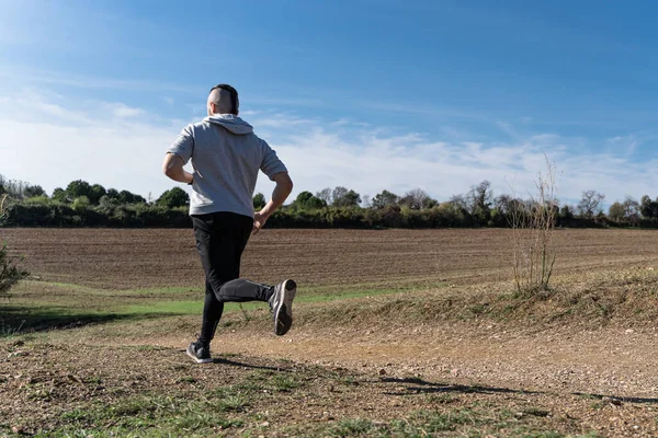 Atleta Corriendo Haciendo Ejercicio Día Cálido Soleado — Foto de Stock