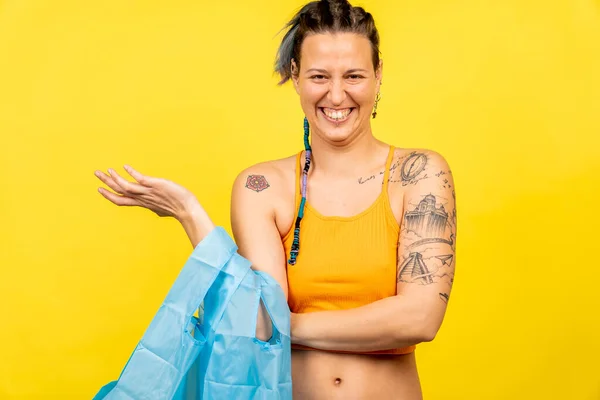 Excited Young Caucasian Female Holding Reusable Shopping Bags Yellow Background — Stock Photo, Image