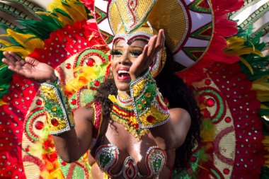 BARRANQU, COLOMBIA - Feb 13, 2018: The comparsa parades their traditional colorful costumes at the Barranquilla carnival clipart