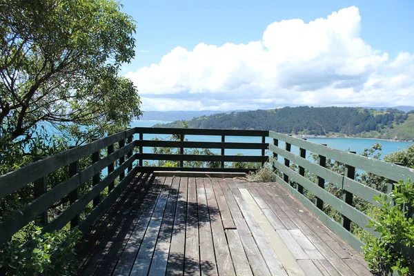 Closeup Shot High Wooden Pier Ocean View Ocean High Mountains — Stock Photo, Image