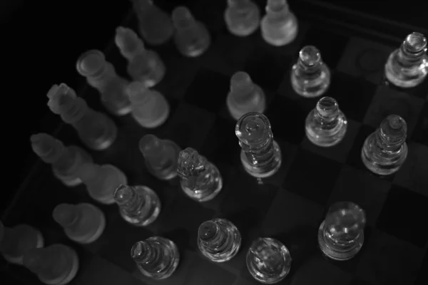 Greyscale Shot Glass Chess Pieces Wooden Chessboard — Stock Photo, Image