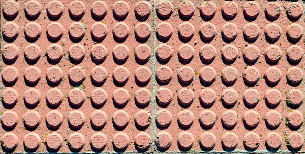 Eine Nahaufnahme Einer Steinmauer Mit Kreismuster — Stockfoto